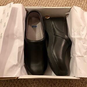 Size 42 NEW Dansko clogs.